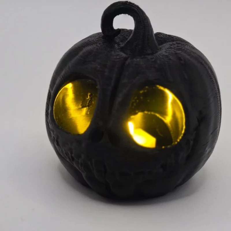 🎃 Spooky Black Pumpkin with Golden Eyes – Creepy Cute Halloween Decor 🖤✨