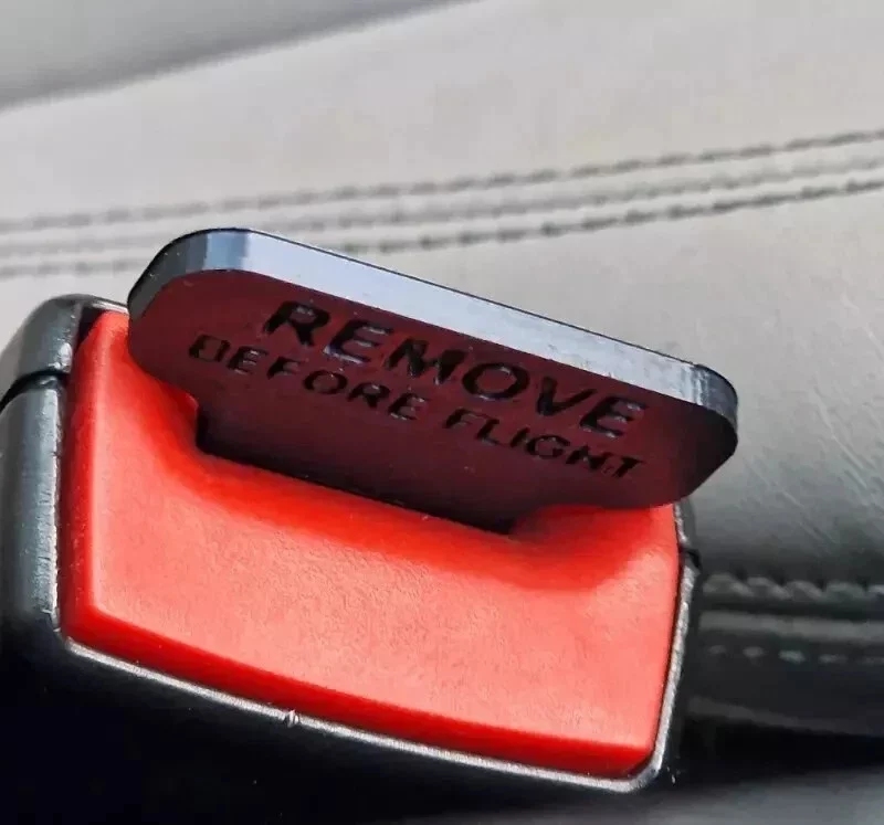 2x Seat Belt Buckle Clips, COLOUR - REMOVE BEFORE FLIGHT - ANY MAKE AND MODEL UK